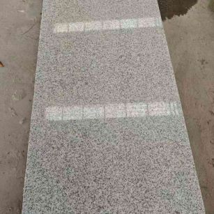 哈尔滨芝麻白光面毛板