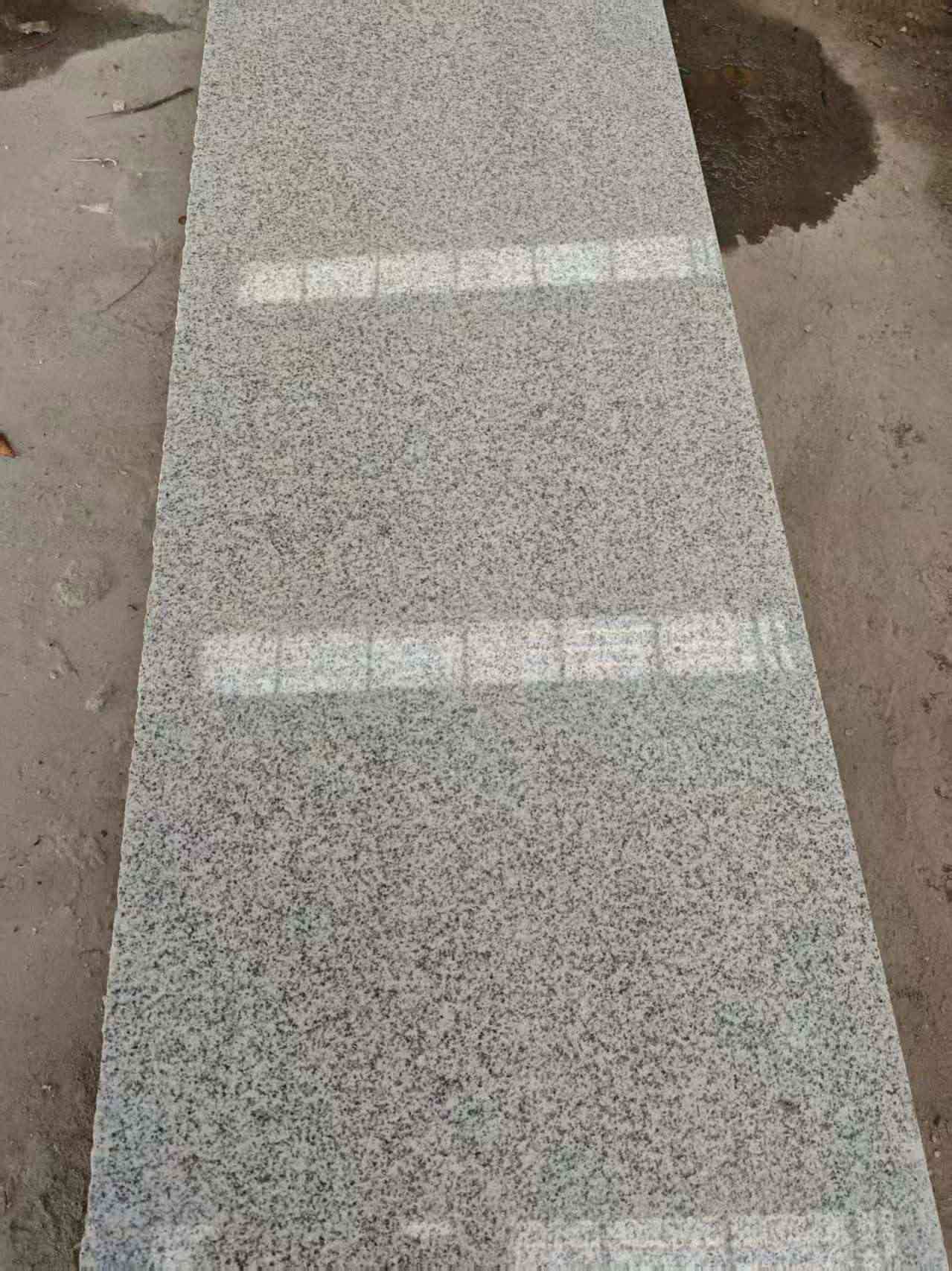 哈尔滨芝麻白光面毛板